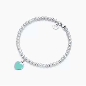 2 for the price of 1! Tiffany Blue Heart Small Pendant and Bracelet bundled